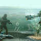 Illustration for article titled How to make a realistic, reverent war movie...with aliens